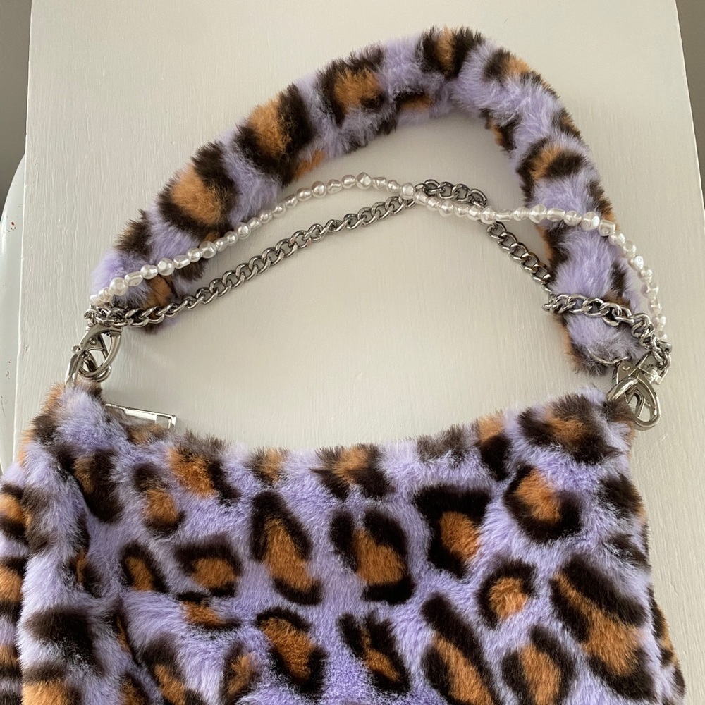 Purple leopard faux fur handbag from Urban